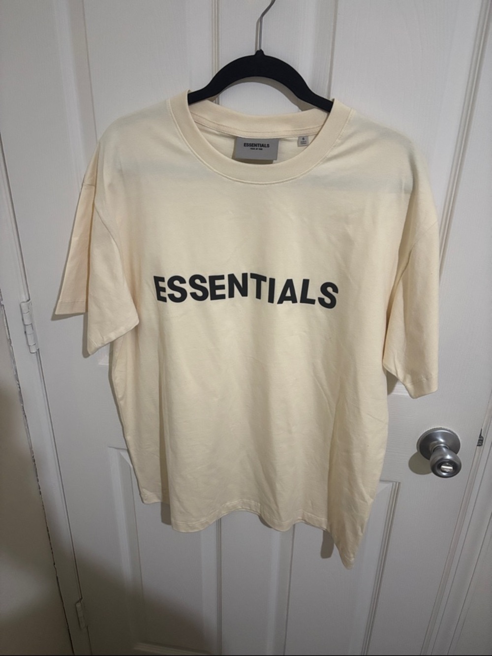 Fear of God Essentials Cream T-Shirt with Black Logo